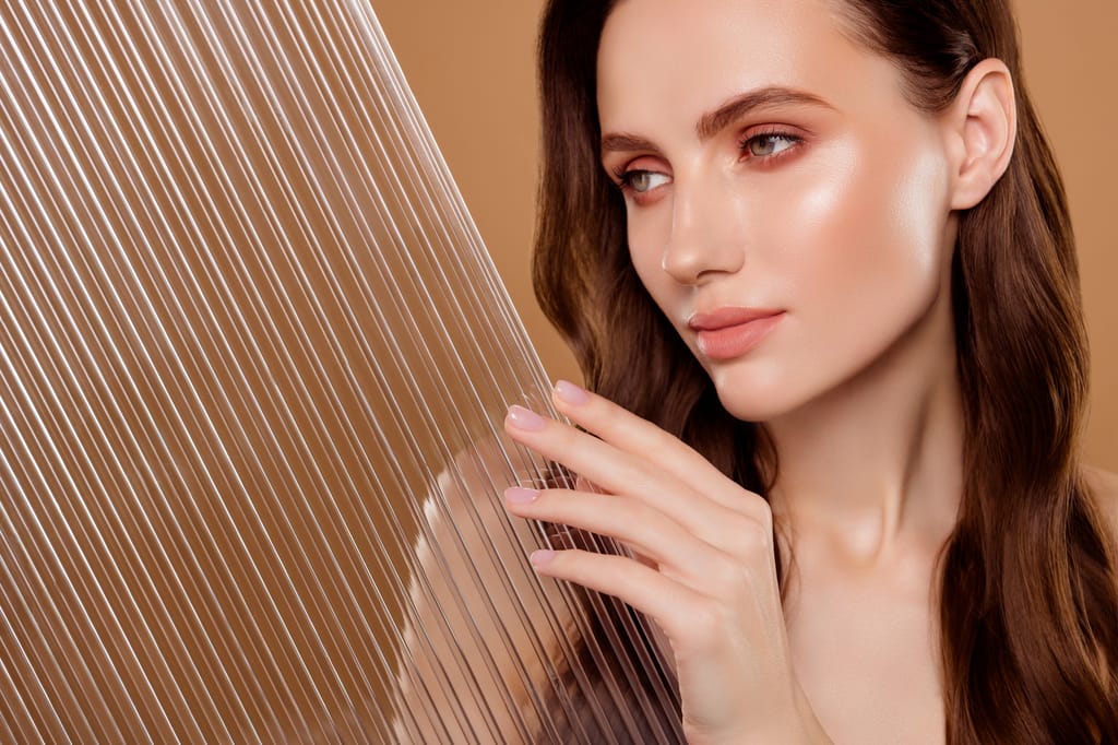 Photo of gorgeous lady cosmetician hold plastic grid for body skin care procedure on pastel color background