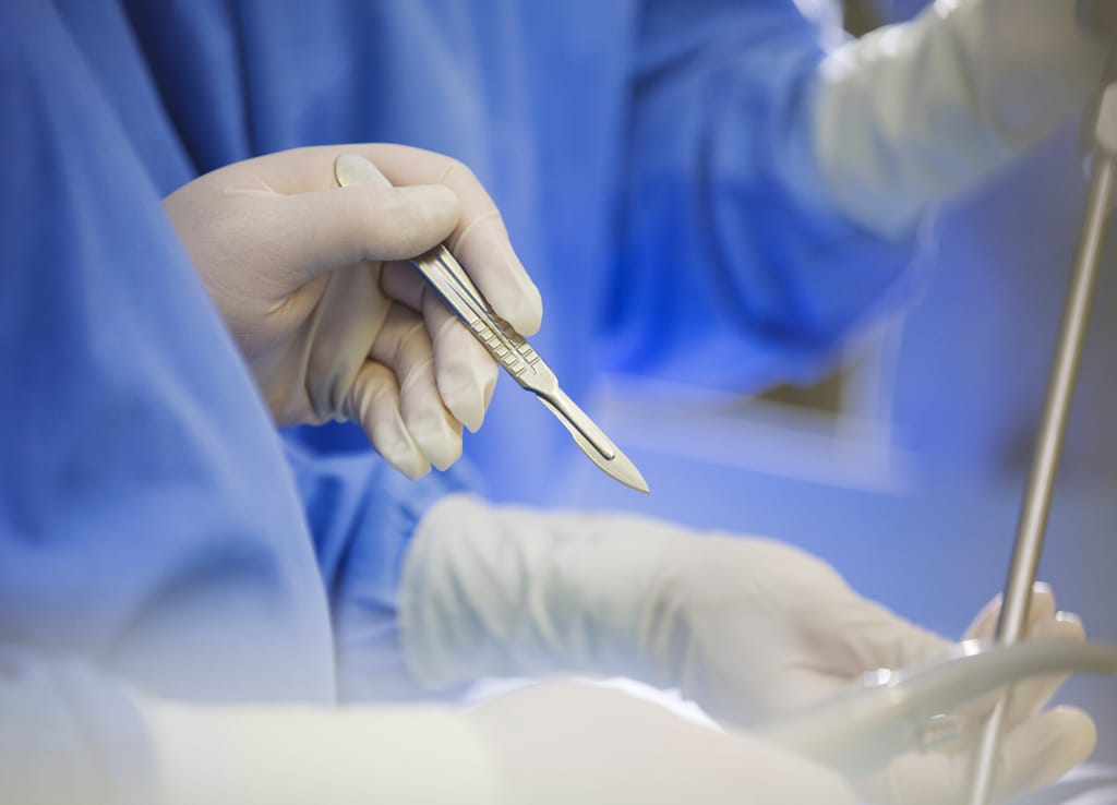Close-up of Mohs surgery being performed on a patient's skin