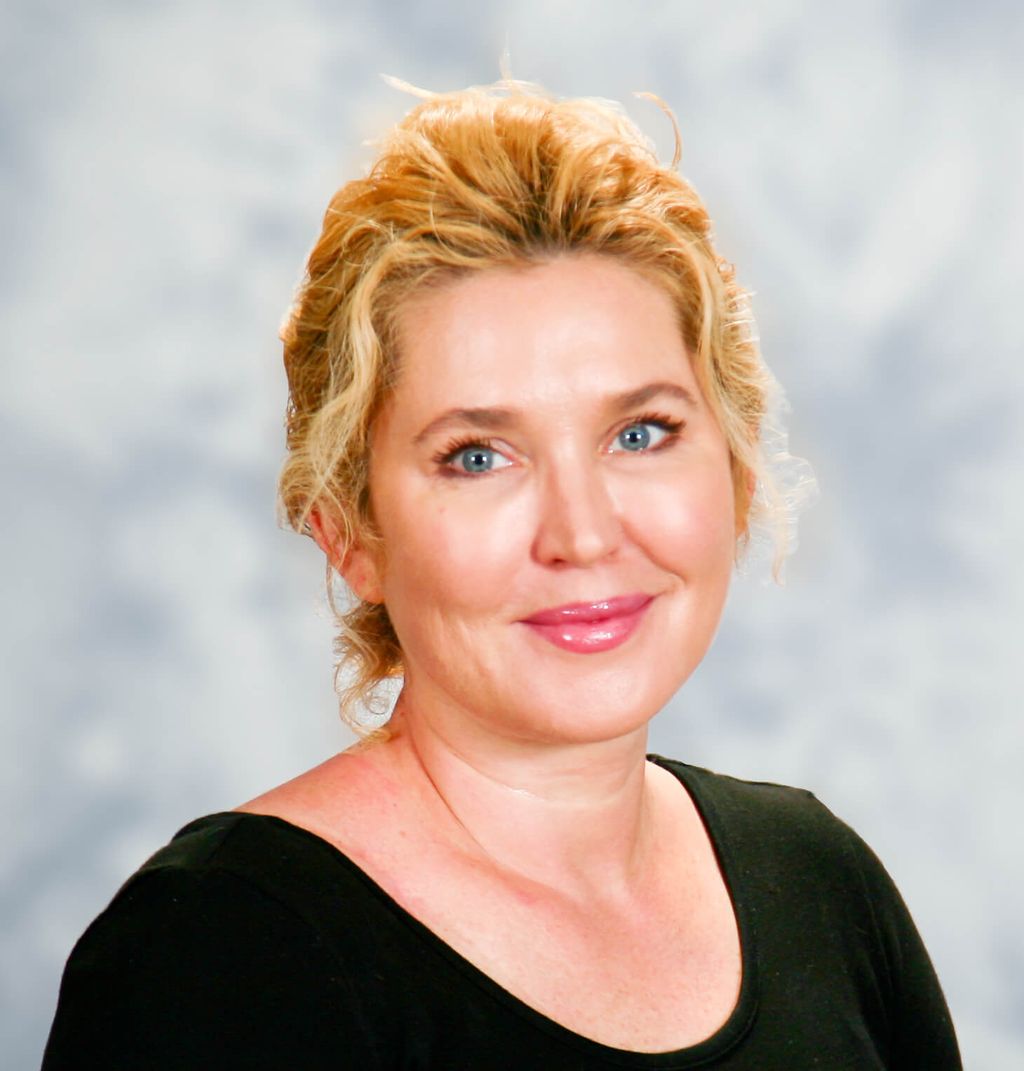 Headshot of Kate Sedlaczek, FNP-C, family nurse practitioner at Forefront Dermatology