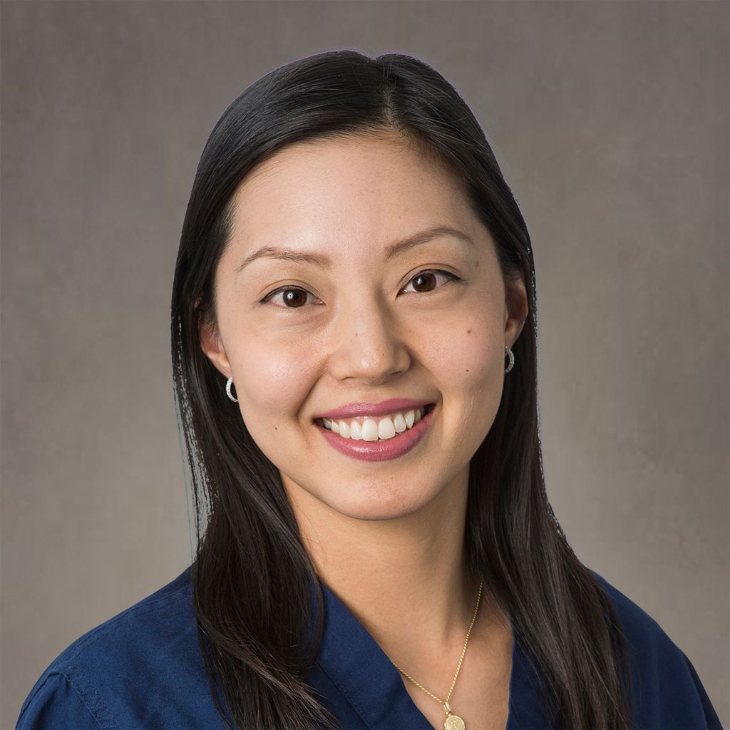 Headshot of Sogyong Auh, FAAD, MD, PhD, board-certified dermatologist at Premier Dermatology