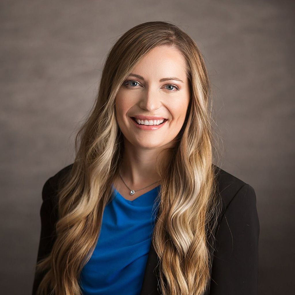 Headshot of Ashley Dietrich, FAAD, MD, board-certified dermatologist at Forefront Dermatology