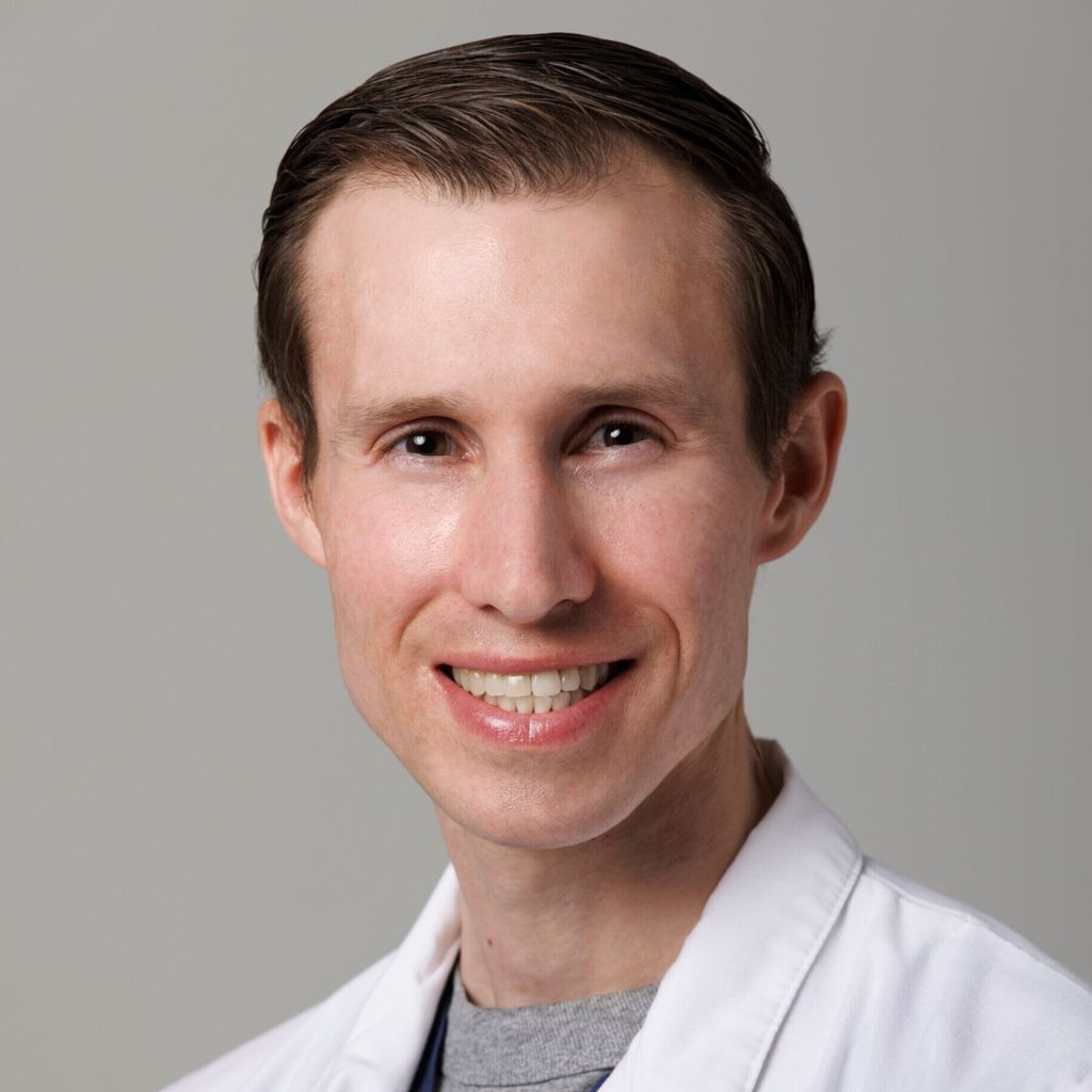 Headshot of John Wuennenberg, FAAD, MD, board-certified dermatologist at Forefront Dermatology