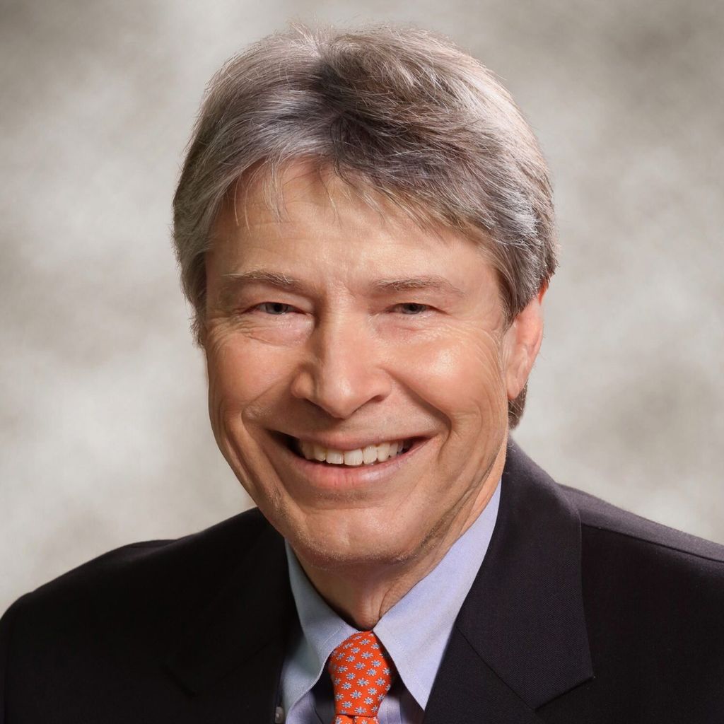 Headshot of Dennis Kurgansky, MD, board-certified dermatologist at Forefront Dermatology