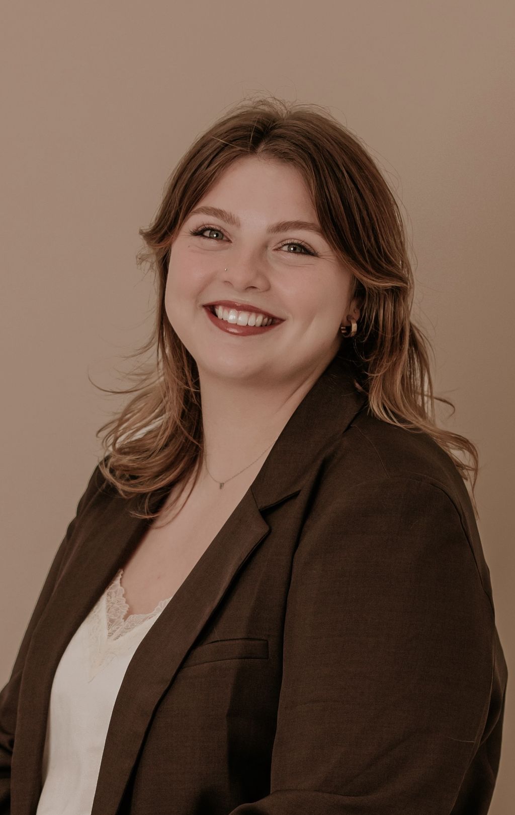 Headshot of Kaitlyn Roselea Cuellar, LE, aesthetician at Forefront Dermatology