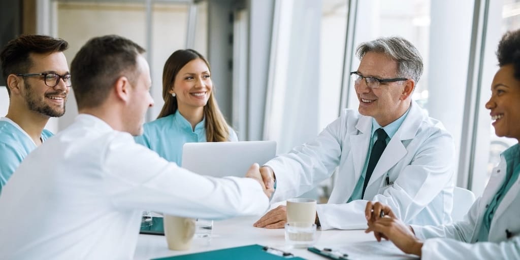 Physicians collaborating at Forefront Dermatology