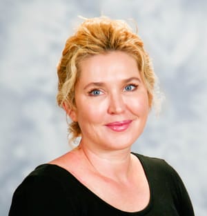 Headshot of Kate Sedlaczek, FNP-C, family nurse practitioner at Forefront Dermatology