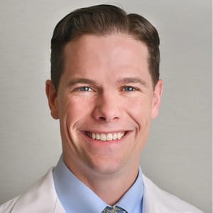Headshot of Andrew Cattell, FNP-C, family nurse practitioner at Forefront Dermatology
