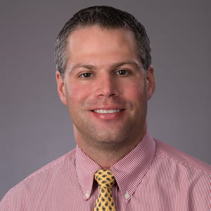 Headshot of Matthew Fanelli, FAAD, MD, board-certified dermatologist at Forefront Dermatology