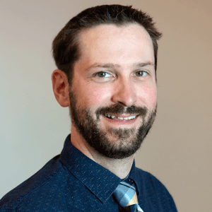 Headshot of Kevin McMullen, FAAD, MD, board-certified dermatologist at Forefront Dermatology