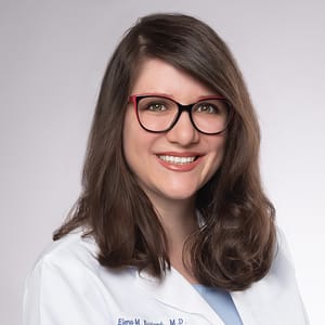Headshot of Elena Maxim Kurland, MD, board-certified dermatologist at Forefront Dermatology