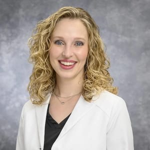 Headshot of Charity Burkhardt, PA-C, certified physician assistant at Compassion Dermatology