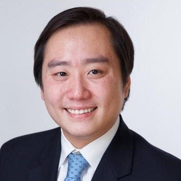 Headshot of Yuhan Gu, MD, board-certified dermatologist at Forefront Dermatology