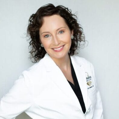 Headshot of Taylor Benoit Mulkey, MD, board-certified dermatologist at Germain Dermatology