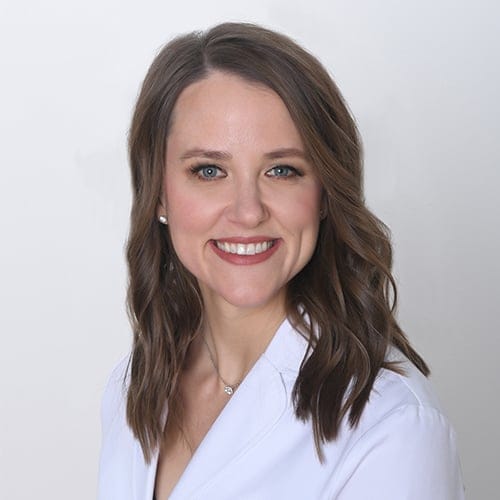 Headshot of Ashlynne Clark, FAAD, MD, board-certified dermatologist at Forefront Dermatology