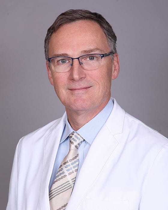 Headshot of Gregory J. Cox, FAAD, MD, board-certified dermatologist at Forefront Dermatology
