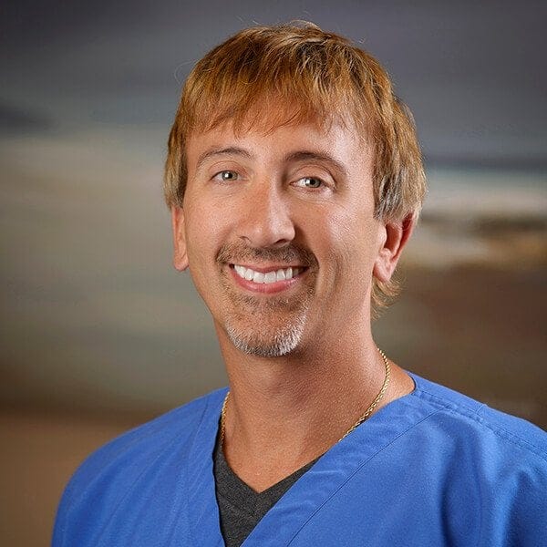 Headshot of Anthony Aulisio, MD, board-certified dermatologist at Gainesville Dermatology