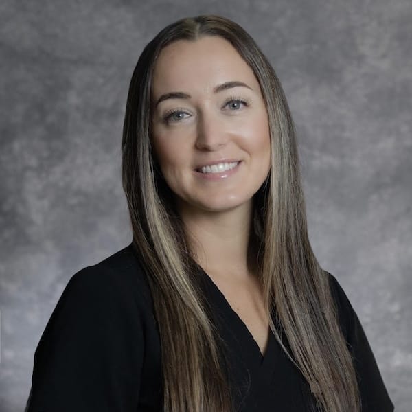 Headshot of Erin McGee, NP-C, certified nurse practitioner at Compassion Dermatology