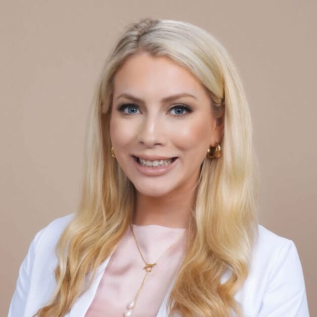 Headshot of Monica Bravo, ABD, FAAD, MD, board-certified dermatologist at Advanced Dermatology & Skin Care Centre