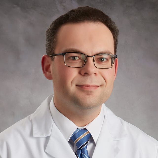 Headshot of Semyon Zarkhin, FAAD, MD, board-certified dermatologist at Forefront Dermatology