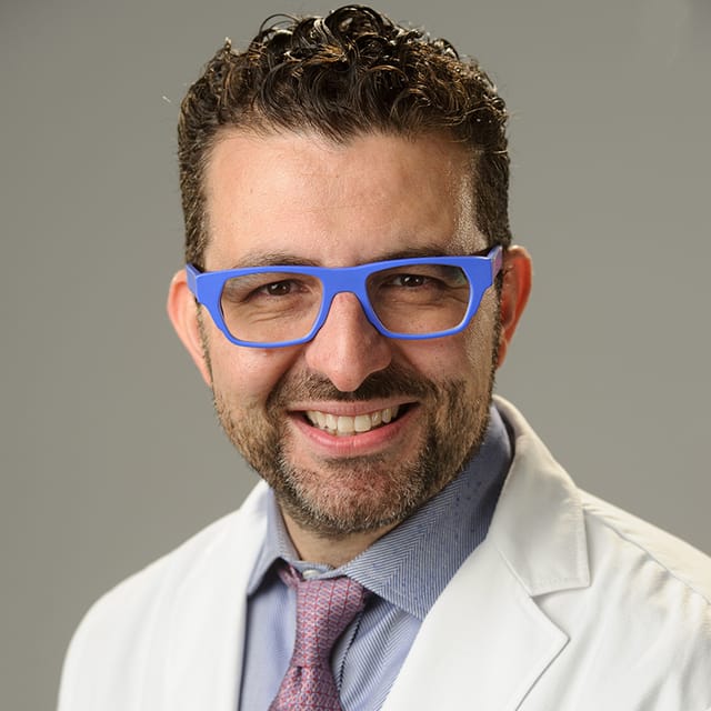 Headshot of Giacomo Maggiolino, FAAD, MD, board-certified dermatologist at Forefront Dermatology