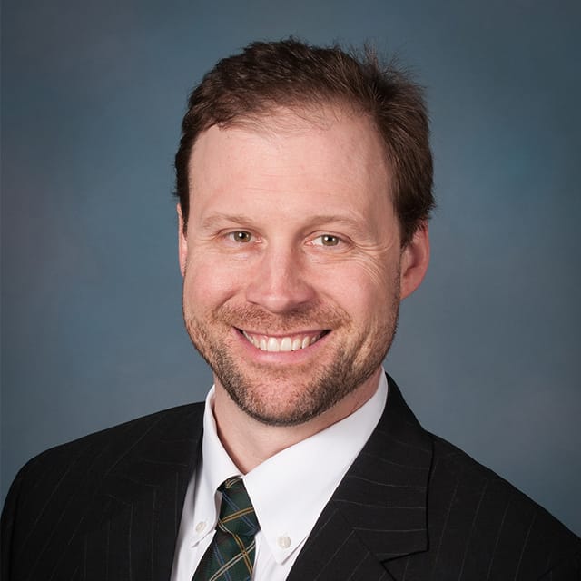 Headshot of Andrew M. DuBois, FAAD, MD, board-certified dermatologist at Forefront Dermatology