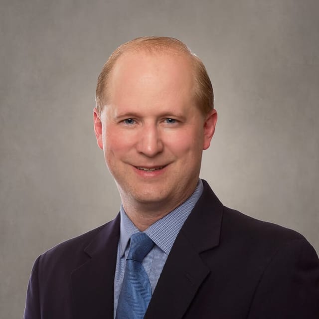 Headshot of Chad A. Brown, FAAD, MD, board-certified dermatologist at DermSpecialists