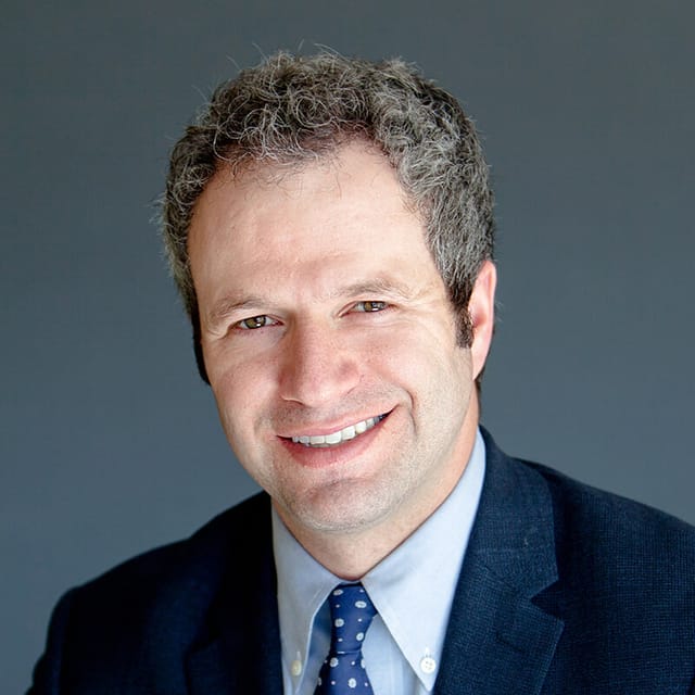 Headshot of Adam Asarch, FAAD, MD, board-certified dermatologist at Forefront Dermatology