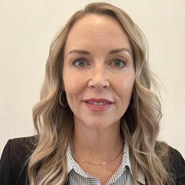 Headshot of Kelli Hutchens, MD, board-certified dermatopathologist at Forefront Dermatology