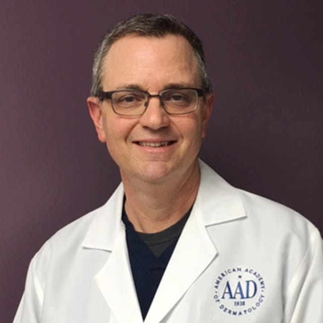Headshot of Kent D. Walker, FAAD, MD, board-certified dermatologist at Forefront Dermatology