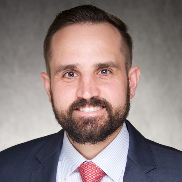 Headshot of Nicholas Bontumasi, FAAD, MD, board-certified dermatologist at Forefront Dermatology