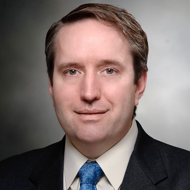 Headshot of Brian Bonish, FAAD, MD, board-certified dermatologist at Forefront Dermatology
