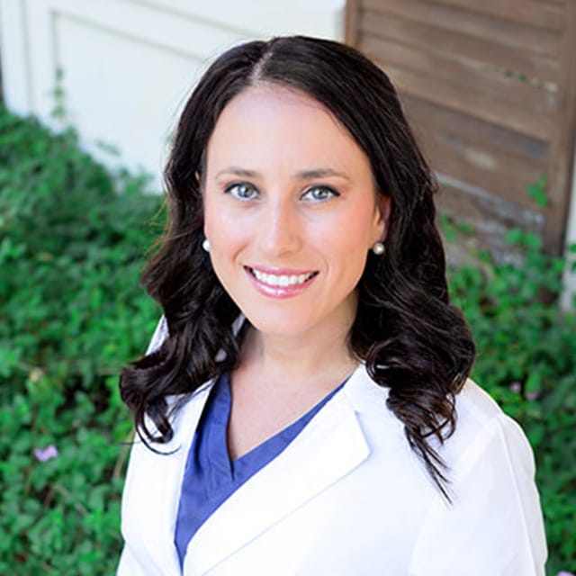 Headshot of Patrizia Lewis, AGNP-C, certified nurse practitioner at Henghold Dermatology