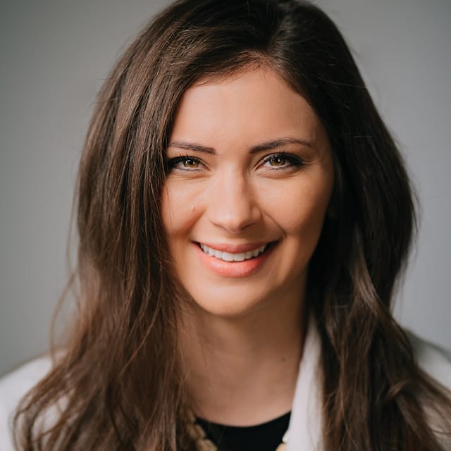 Headshot of Margaret Maxi, FAAD, MD, board-certified dermatologist at Forefront Dermatology