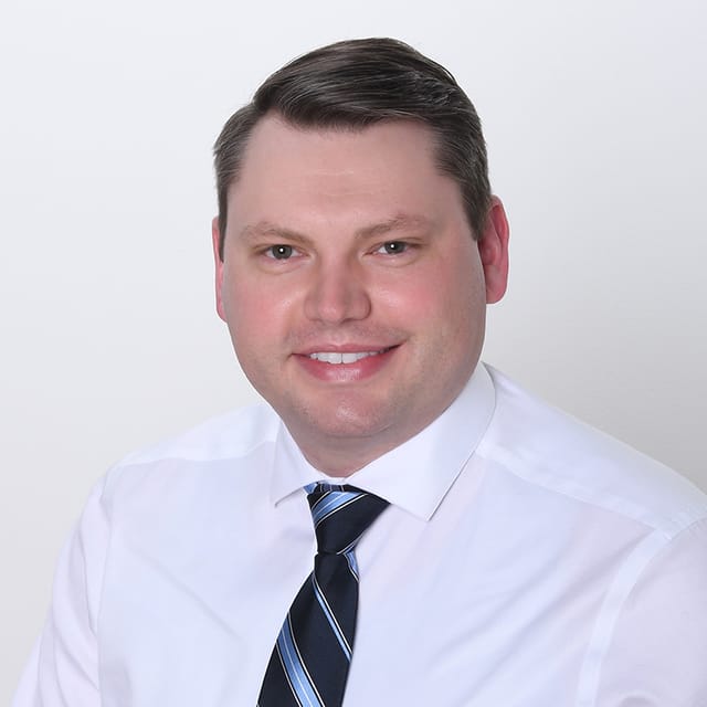 Headshot of Paul H. Fenton, FAAD, MD, board-certified dermatologist at Forefront Dermatology