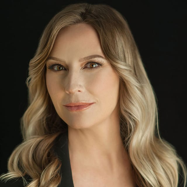 Headshot of Rebecca Novo, MD, board-certified plastic surgeon at Florida Dermatology & Plastic Surgery