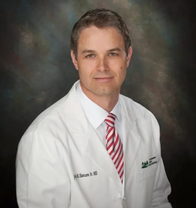 Headshot of Joseph Hanson, FAAD, MD, board-certified dermatologist at Tennessee River Dermatology
