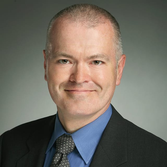 Headshot of Douglas Hansen, MD, board-certified dermatopathologist at Forefront Dermatology