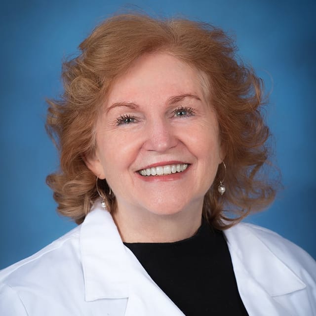 Headshot of Elizabeth Burke, FAAD, MD, board-certified dermatologist at Forefront Dermatology