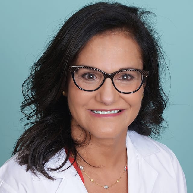 Headshot of Luciann Hruza, FAAD, MD, board-certified dermatologist at Forefront Dermatology