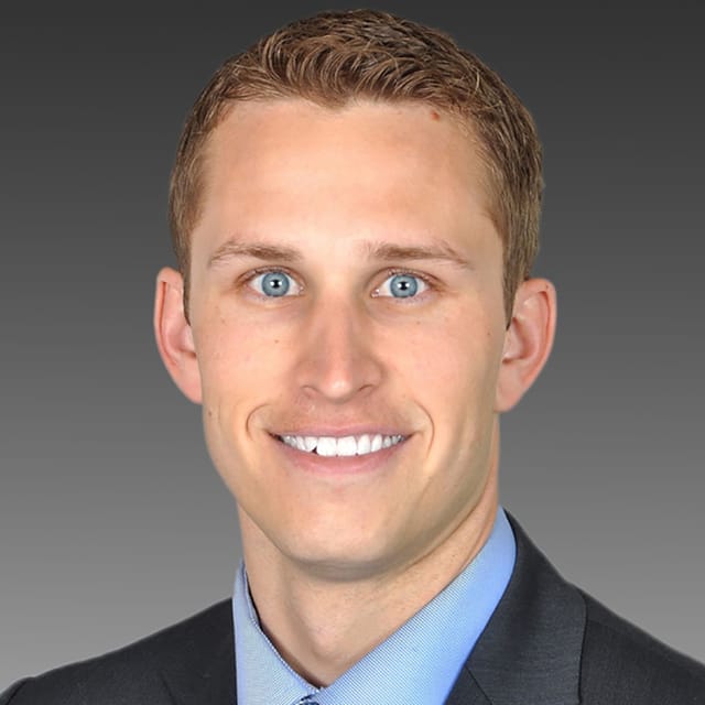 Headshot of Sean Condon, FAAD, MD, board-certified dermatologist at Forefront Dermatology