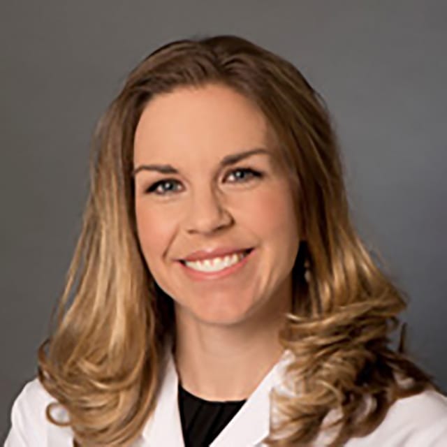 Headshot of Christine Cole, FAAD, MD, board-certified dermatologist at Forefront Dermatology
