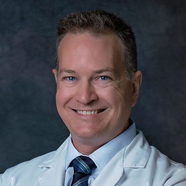 Headshot of Adam Gomoll, PA-C, certified physician assistant at Forefront Dermatology