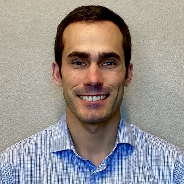 Headshot of Charles Schultz, MD, board-certified dermatopathologist at Forefront Dermatology
