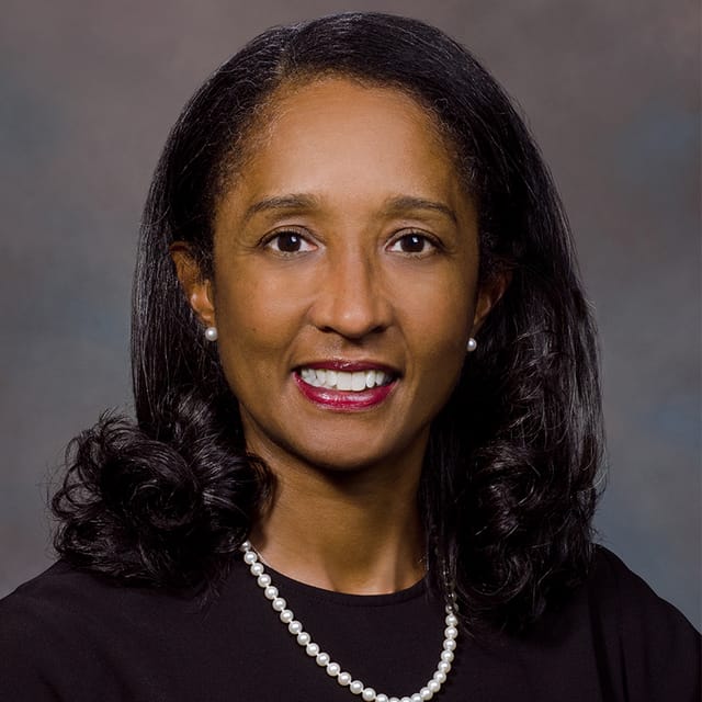 Headshot of Lydia Johnson, FAAD, MD, board-certified dermatologist at Forefront Dermatology
