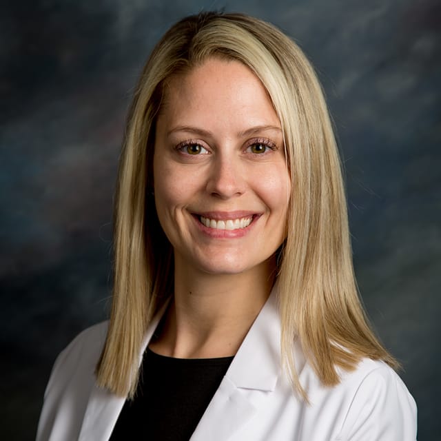 Headshot of Alexis Lyons, FAAD, MD, board-certified dermatologist at Forefront Dermatology