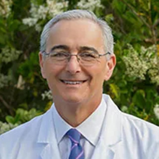 Headshot of Morgan Magid, MD, board-certified dermatologist at Dermatology Surgical & Medical Group