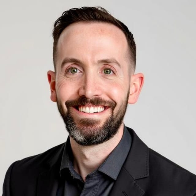 Headshot of Brandon Zelman, DO, board-certified dermatopathologist at Forefront Dermatology