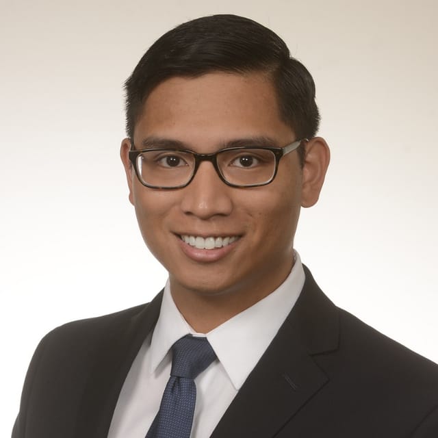 Headshot of Freidrich Anselmo, MD, board-certified dermatologist at Forefront Dermatology