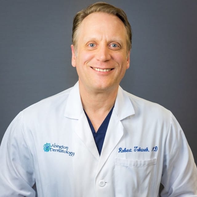 Headshot of Robert Michael Tokarek, MD, board-certified dermatologist at Forefront Dermatology