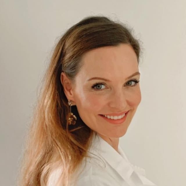 Headshot of Lise Dobysh Brown, DO, board-certified dermatologist at Skin Center